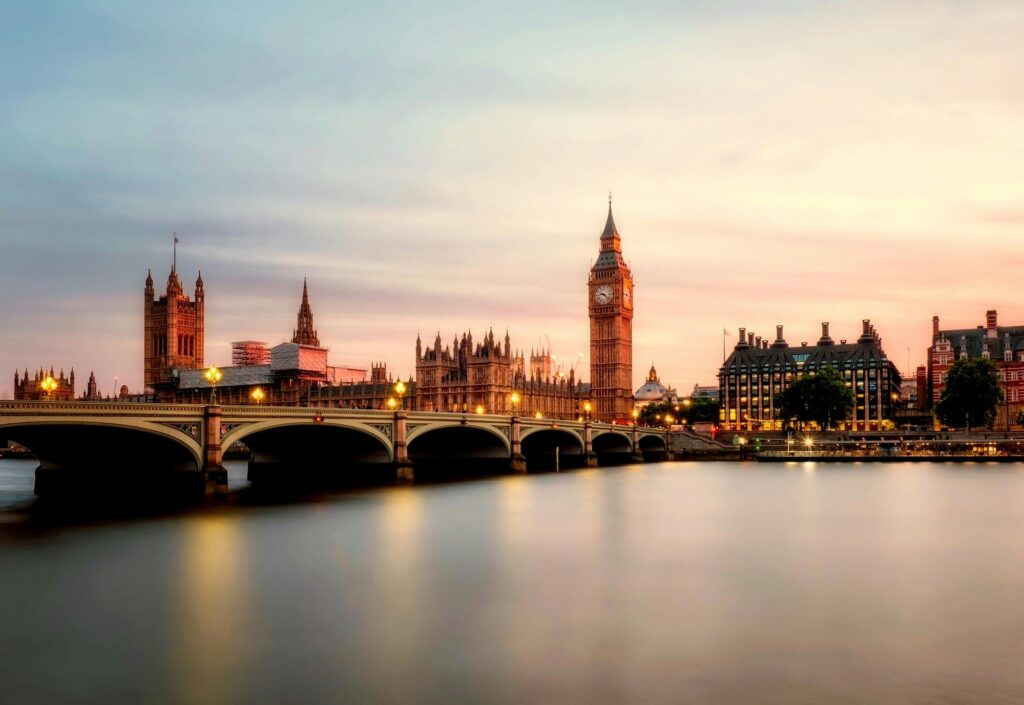 Westminster Bridge and Big Ben glowing at dusk